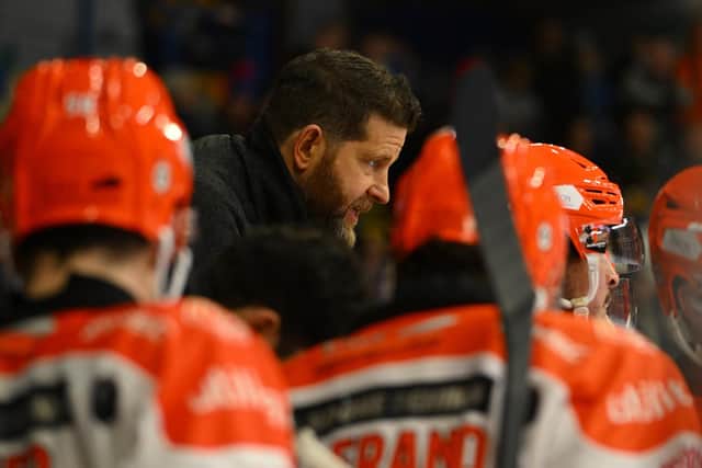 ICY BLAST: Sheffield Steelers' head coach Aaron Fox instructs his players on Saturday night at the National Ice Centre. Picture: Dean Woolley/Steelers Media