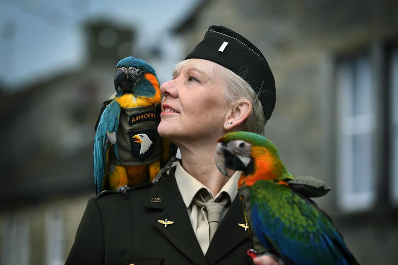 Grassington 1940's weekend.
Pictured Tina Outram with her parrots.
Photographed for the Yorkshire Post by Jonathan Gawthorpe.
17th September 2023. 
