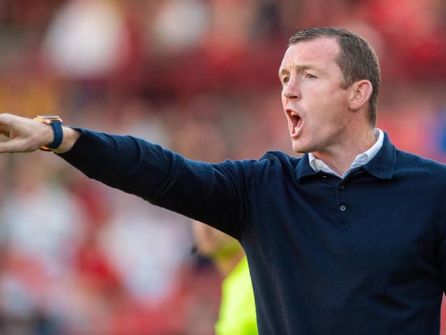 ADMIRER: Barnsley manager Neill Collins is a fan of Shrewsbury Town's Paul Hurst