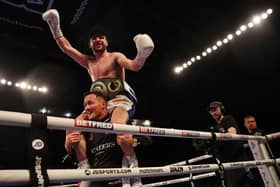 NOTTINGHAM, ENGLAND - SEPTEMBER 24: Maxi Hughes celebrates on the shoulders of Josh Warrington after defeating Kid Galahad in the IBO World Lightweight title fight between Maxi Hughes and Kid Galahad at Motorpoint Arena Nottingham on September 24, 2022 in Nottingham, England. (Photo by Nathan Stirk/Getty Images)