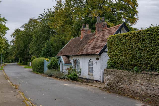 Feature on North Ferriby photographed by Tony Johnson for The Yorkshire Post.  
18th century historical buildings, Moss Cottage and Honeysuckle Cottage on Station Road.