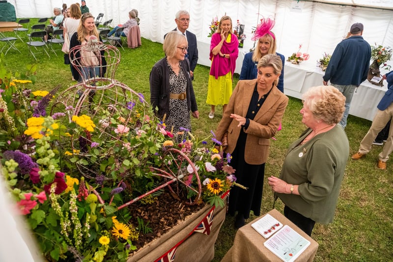 The Duchess of Edinbugh admires a floral arrangement as a tribute to the Coronation of King Charles III and Queen Camilla by Driffield Flower Club.