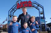 Dane and his children at Luna Park. (Pic credit: Dane Crow)