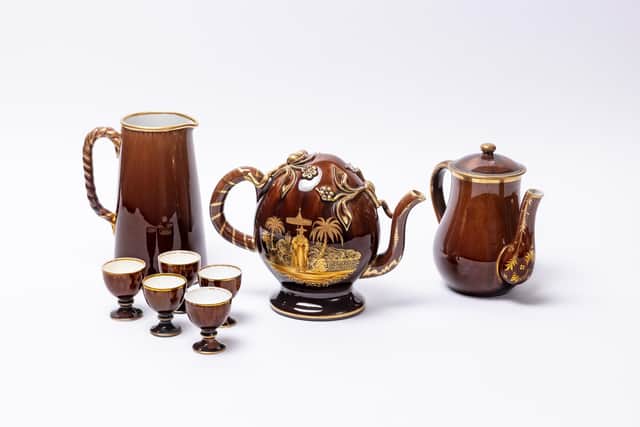 Earthenware Rockingham Brown Glaze Cadogan teapot with egg cups and jugs