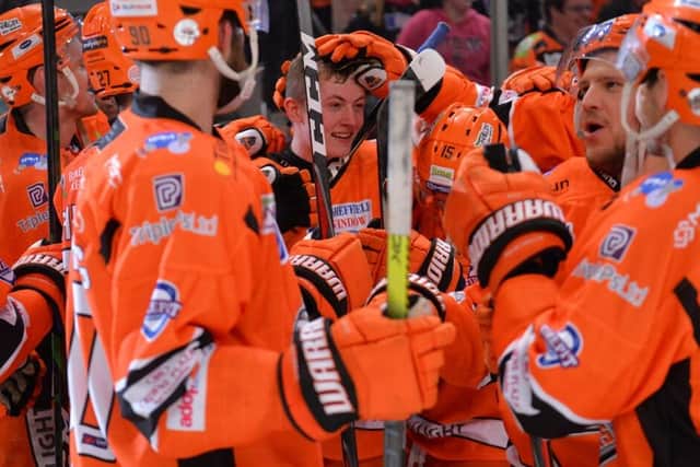 SHOCK: Alex Graham, pictured being congratulated by his Sheffield Steelers' team-mates. Picture courtesy of Dean Woolley/Steelers Media.