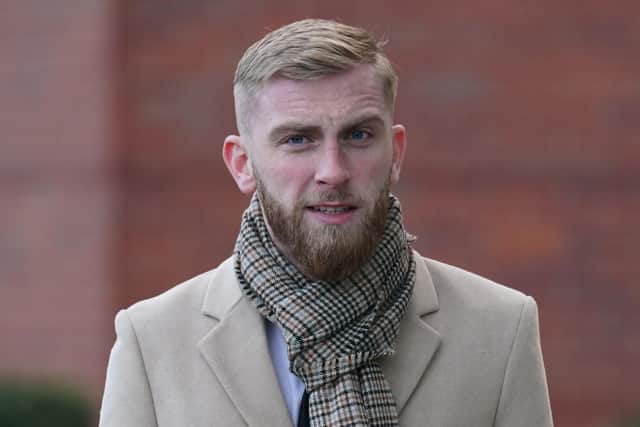 Sheffield United footballer Oli McBurnie, 26, of Knaresborough, North Yorkshire, arrives at Nottingham Magistrates' Court where he is charged with assault by beating. The footballer is alleged to have assaulted Nottingham Forest fan George Brinkley during a pitch invasion at the City Ground following a play-off semi-final on May 17. Picture date: Wednesday December 14, 2022.