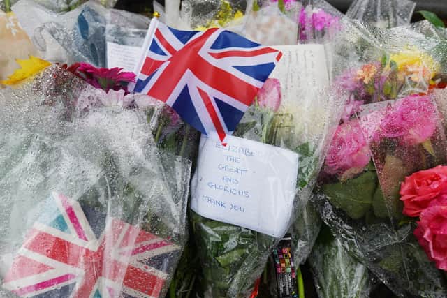 Flowers left in memory and tribute to Queen Elizabeth II.