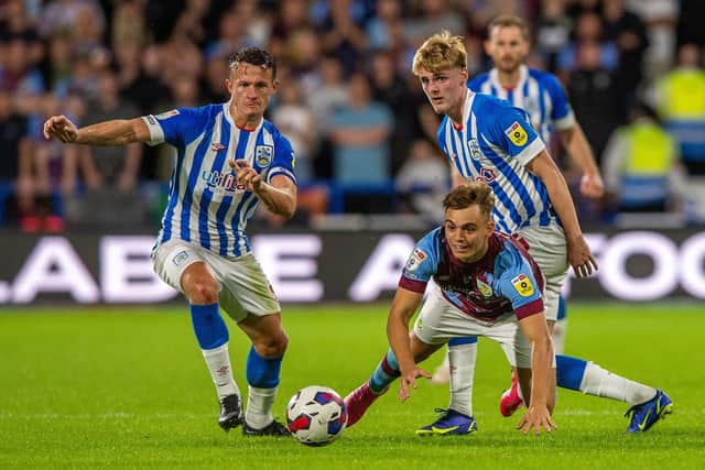 INJURY: Jonathan Hogg (left) will be missing for Huddersfield Town