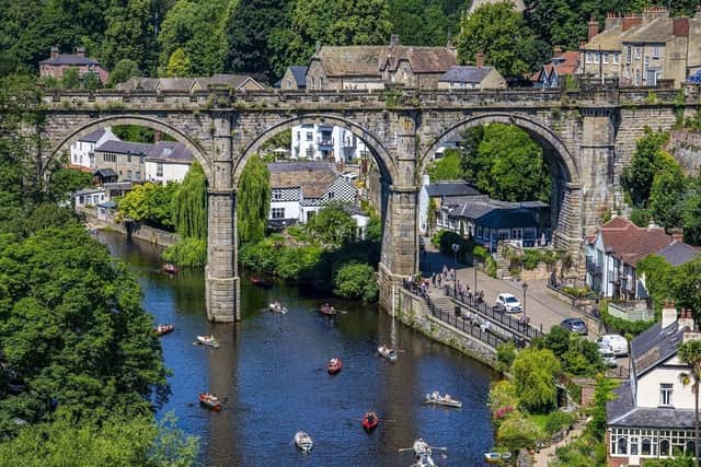 Two police officers who literally put their lives on the line to save a suicidal man they found lying across the railway line on the viaduct over the River Nidd at Knaresborough