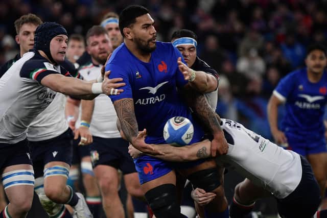 Italy's full back Edoardo Padovani (R) tackles France's lock Romain Taofifenua during the Six Nations international rugby union match (Picture: FILIPPO MONTEFORTE/AFP via Getty Images)