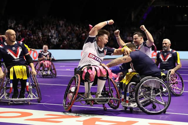 Tom Halliwell celebrates scoring the winning try in the Wheelchair Rugby League World Cup final. (Photo by Charlotte Tattersall/Getty Images for RLWC)