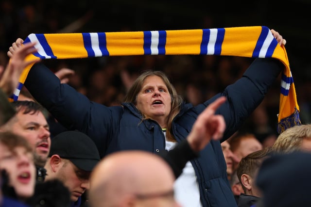 A Leeds United fan shows their support with a scarf during the Premier League match between Leeds United and AFC Bournemouth at Elland Road on November 5.