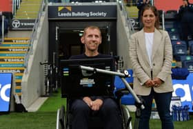 Leeds legend Rob Burrow pictured with his wife Lindsey at a match between the Rhinos and Huddersfield Giants in 2021. (Photo: Jonathan Gawthorpe)