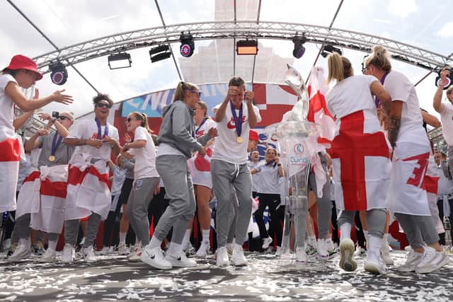 England players sing Sweet Caroline on stage during a fan celebration to commemorate England's historic UEFA Women's EURO 2022 triumph in Trafalgar Square, London. Picture date: Monday August 1, 2022.