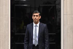 British Prime Minister Rishi Sunak poses for the media after taking office outside Number 10 in Downing Street on October 25, 2022. (Photo by Leon Neal/Getty Images)