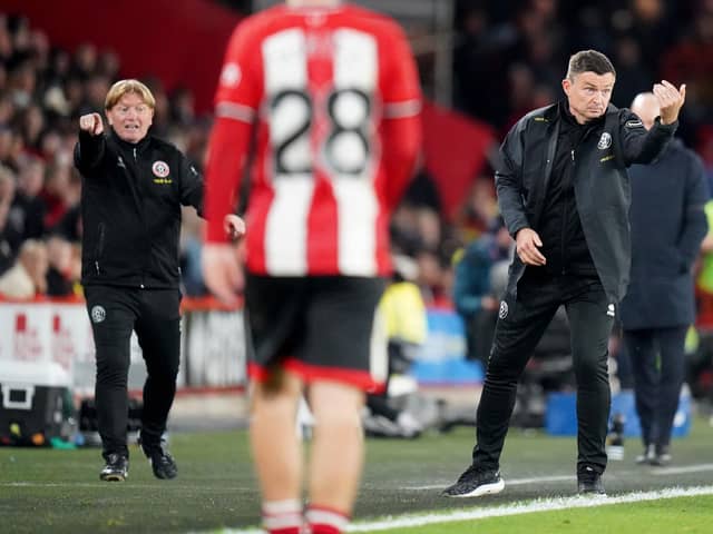 SATISFACTION: Sheffield United manager Paul Heckingbottom (right)
