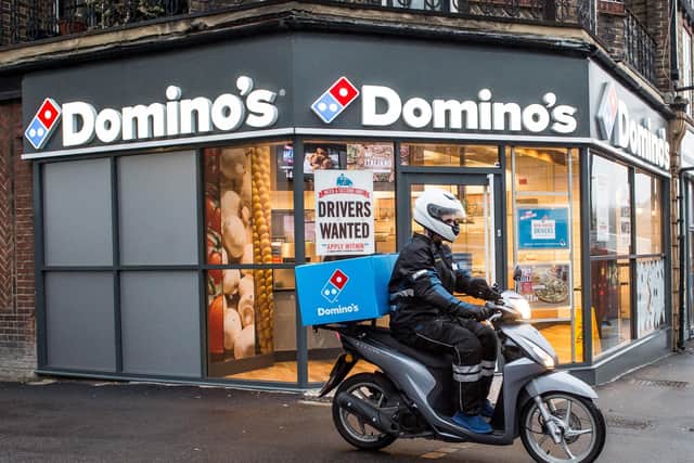 Domino’s Pizza has revealed slower sales growth for the latest quarter despite boosts from new ranges of thinner pizzas and fried chicken.(Photo by Domino's/PA Wire)