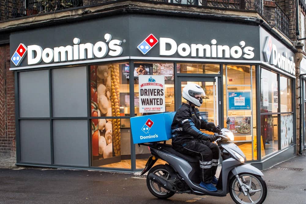 Domino’s Pizza has revealed slower sales growth for the latest quarter despite boosts from new ranges of thinner pizzas and fried chicken.(Photo by Domino's/PA Wire)
