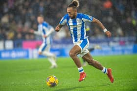 Difference maker: Sorba Thomas was the outstanding player on the pitch for Huddersfield, even if they couldn't avoid defeat against Middlesbrough on Friday night (Picture: Bruce Rollinson)