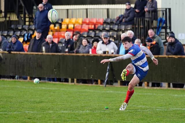 Elliot Fisher kicks over a conversion for Sheffield RUFC against Hull (Picture: Mike Inkley)