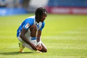 HUDDERSFIELD, ENGLAND - MAY 01:  Rolando Aarons of Huddersfield Town during the Sky Bet Championship match between Huddersfield Town and Coventry City at John Smith's Stadium on May 01, 2021 in Huddersfield, England. Sporting stadiums around the UK remain under strict restrictions due to the Coronavirus Pandemic as Government social distancing laws prohibit fans inside venues resulting in games being played behind closed doors. (Photo by Alex Livesey/Getty Images)