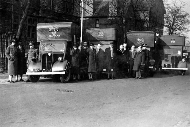 Mobile Canteens parked in front of Council Offices on Marsh Street on the occasion of Rothwell Urban District Council, Mobile Canteens fund Presentation in April 1941.