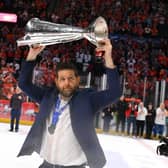 OVER THE LINE: Sheffield Steelers' head coach, Aaron Fox, celebrates with the Elite LEague championship trophy. Picture: Dean Woolley/Steelers Media.