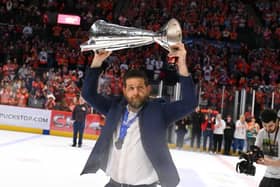 OVER THE LINE: Sheffield Steelers' head coach, Aaron Fox, celebrates with the Elite LEague championship trophy. Picture: Dean Woolley/Steelers Media.