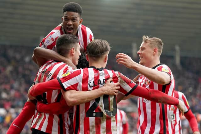 Sunderland's Ross Stewart celebrates scoring the opening goal with his team mates during the Sky Bet Championship match at the Stadium of Light, Sunderland. Picture date: Sunday January 22, 2023. PA Photo. See PA story SOCCER Sunderland. Photo credit should read: Owen Humphreys/PA Wire.
RESTRICTIONS: EDITORIAL USE ONLY No use with unauthorised audio, video, data, fixture lists, club/league logos or "live" services. Online in-match use limited to 120 images, no video emulation. No use in betting, games or single club/league/player publications.