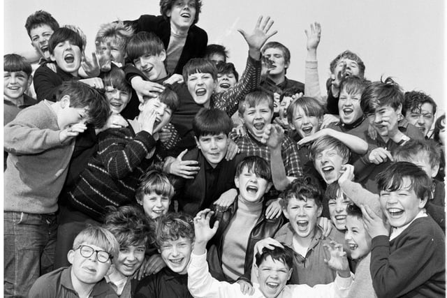 A crowd of noisy pupils give a cheer at the James Clark School's sports day held at Kirk Brae in Liberton in June 1966.