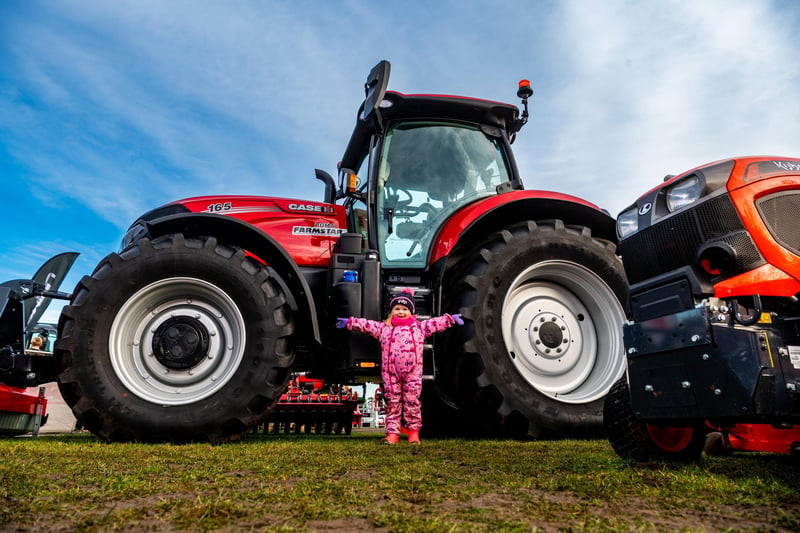 Young farmer Florence Wainman, aged three of Newport, East Yorkshire, with a CASE iH 165 Puma FARMSTAR Tractor whilst enjoying the machinery show.