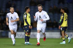 OXFORD, ENGLAND - FEBRUARY 01: Nicky Cadden of Barnsley celebrates after scoring the team's second goal during the Sky Bet League One between Oxford United and Barnsley at Kassam Stadium on February 01, 2023 in Oxford, England. (Photo by Richard Heathcote/Getty Images)