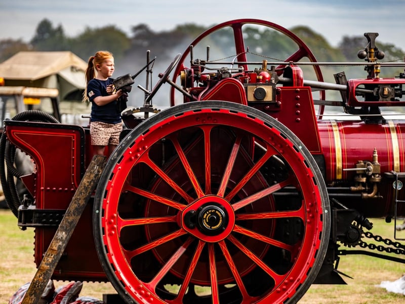 Pictured Lily Appleby, aged 6, of Pickering, oiling the gears on her grandfathers 1901 - 7HP Marshall Traction Engine. Picture: James Hardisty. Date: 6nd September 2026.