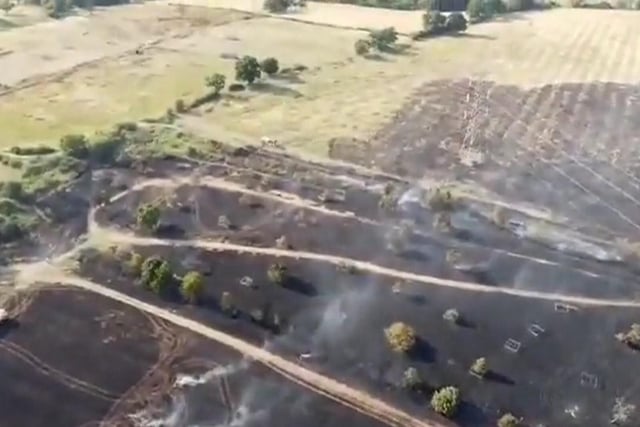 Drone footage of the aftermath of a field fire by Cheshunt Park that started on Monday.