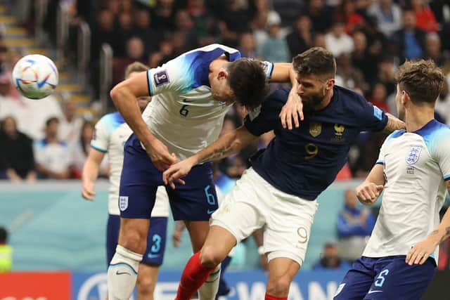 France's forward Olivier Giroud beats Harry Maguire in the air to head the winner for France (Picture: ADRIAN DENNIS/AFP via Getty Images)