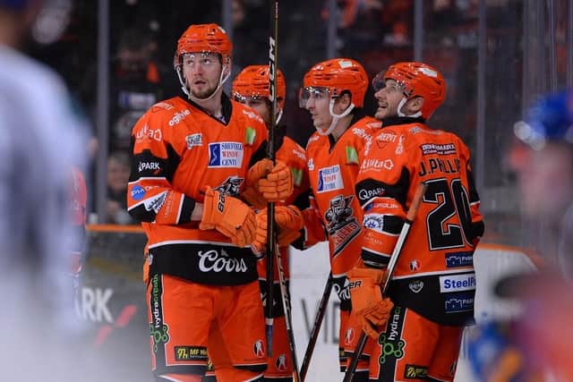 GOOD START: Sheffield Steelers' Davey Phillips (left) pictured in action during last month's win over Elite League rivals Fife Flyers. Picture courtesy of Dean Woolley.