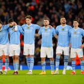 Manchester City players look on dejected during the penalty shoot out following the UEFA Champions League quarter-final, second leg match at the Etihad Stadium, Manchester. PIC: Mike Egerton/PA Wire.