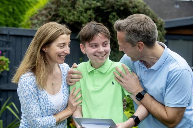 Seb Murphy, 16, of Guiseley, gained top marks in his GCSEs despite significant health challenges. He is delighted he managed to sit all his nine GCSEs. Here is is pictured with his parents, Helen and Ben Murphy. Photo provided by Bradford Grammar School.