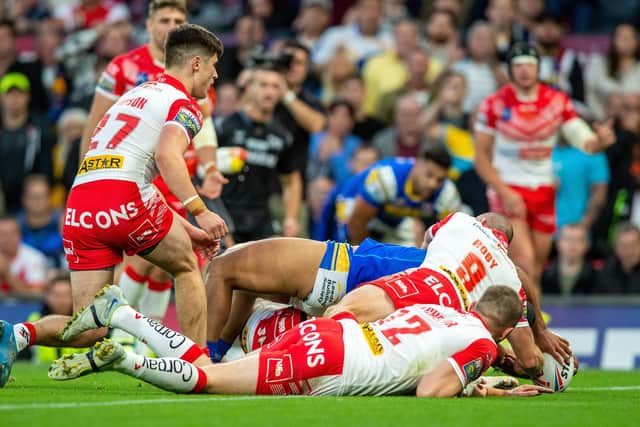 Kruise Leeming scores Leeds Rhinos' first try. (Picture: Bruce Rollinson)