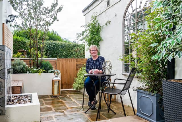Fiona Beard in the garden of her Wetherby cottage