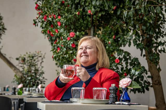 Chair Of The Board Of Trustees at the Wentworth Woodhouse Preservation Trust  Dame Julie Kenny DBE DL  takes tea in the restored Camellia House on  the estate,  photographed by Tony Johnson for The Yorkshire Post.  22nd March 2024