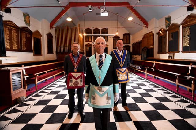 Neil Armstrong, Russ Garbutt and Jim Kerr in Hull Masonic Lodge