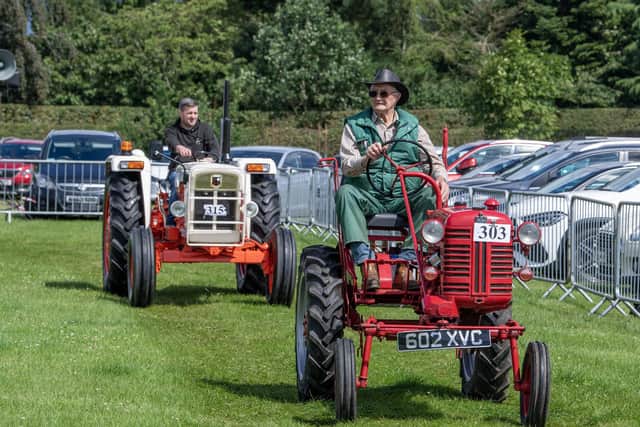 Vintage tractors parade at Borrowby Show photographed for the Yorkshire Post by Tony Johnson  29th July 2023