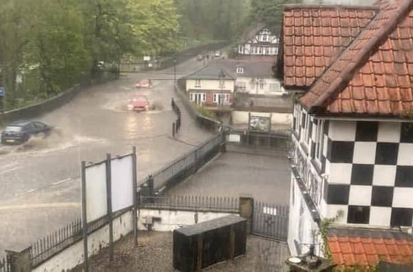 Last night's sudden storm saw the River Nidd burst its banks near the World’s End pub and Mother Shipton’s in Knaresborough with water rising onto the Low Bridge itself. (Picture contributed)