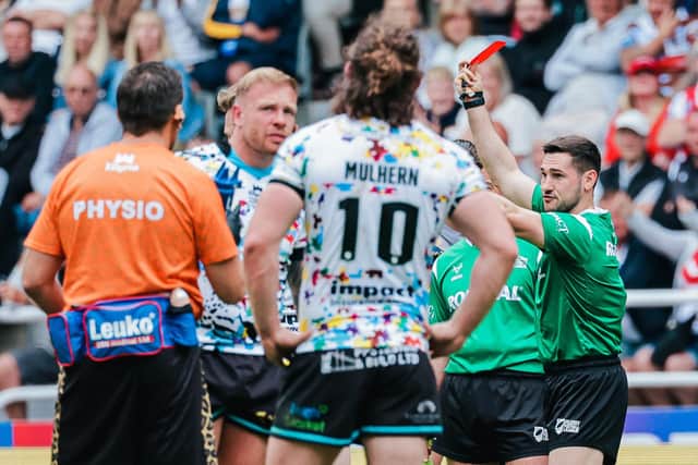 Referee Aaron Moore shows Leigh’s Ben Reynolds (obscured) a red card. (Photo: Alex Whitehead/SWpix.com)