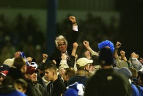PAINFUL NIGHT: Cardiff City chairman Sam Hamman celebrates his side's FA Cup third-round win which started Leeds United's slide