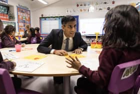 Prime Minister Rishi Sunak speaks to pupils in a year one maths class during a visit to the Wren Academy school in Finchley, north London. PIC: Richard Pohle/The Times /PA Wire