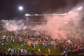 INVASIONS: Nottingham Forest fans take to the pitch after the Championship play-Off semi-final second leg match in May