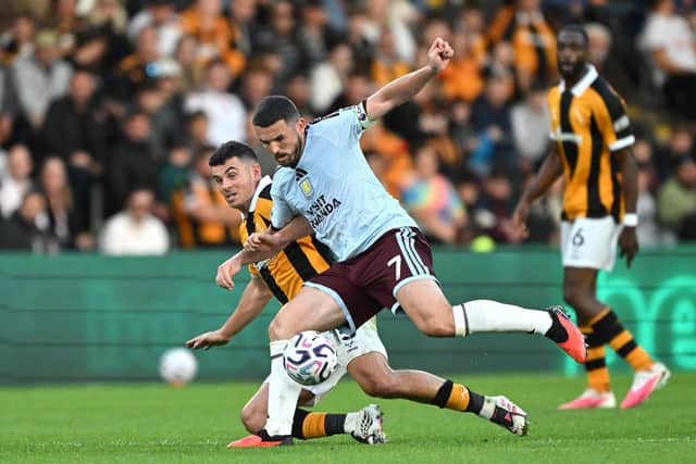 BIG TACKLES: John Egan (left) dispossesses Aston Villa's John McGinn (Image: Press Association)