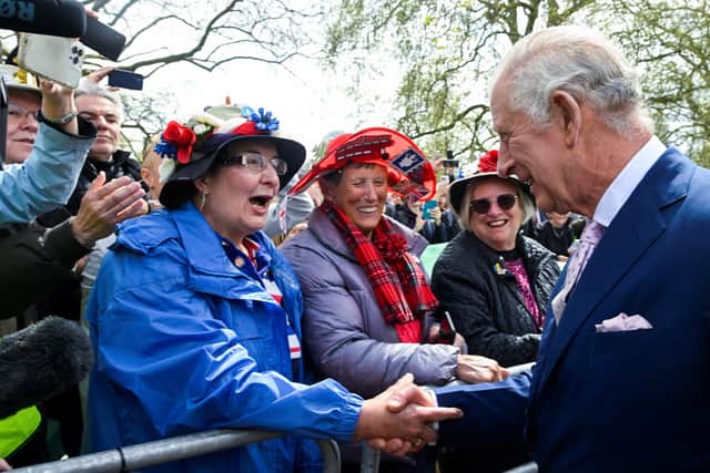 King Charles III on a walkabout outside Buckingham Palace, London, to meet wellwishers ahead of the coronation on Saturday. PIC: Toby Melville/PA Wire